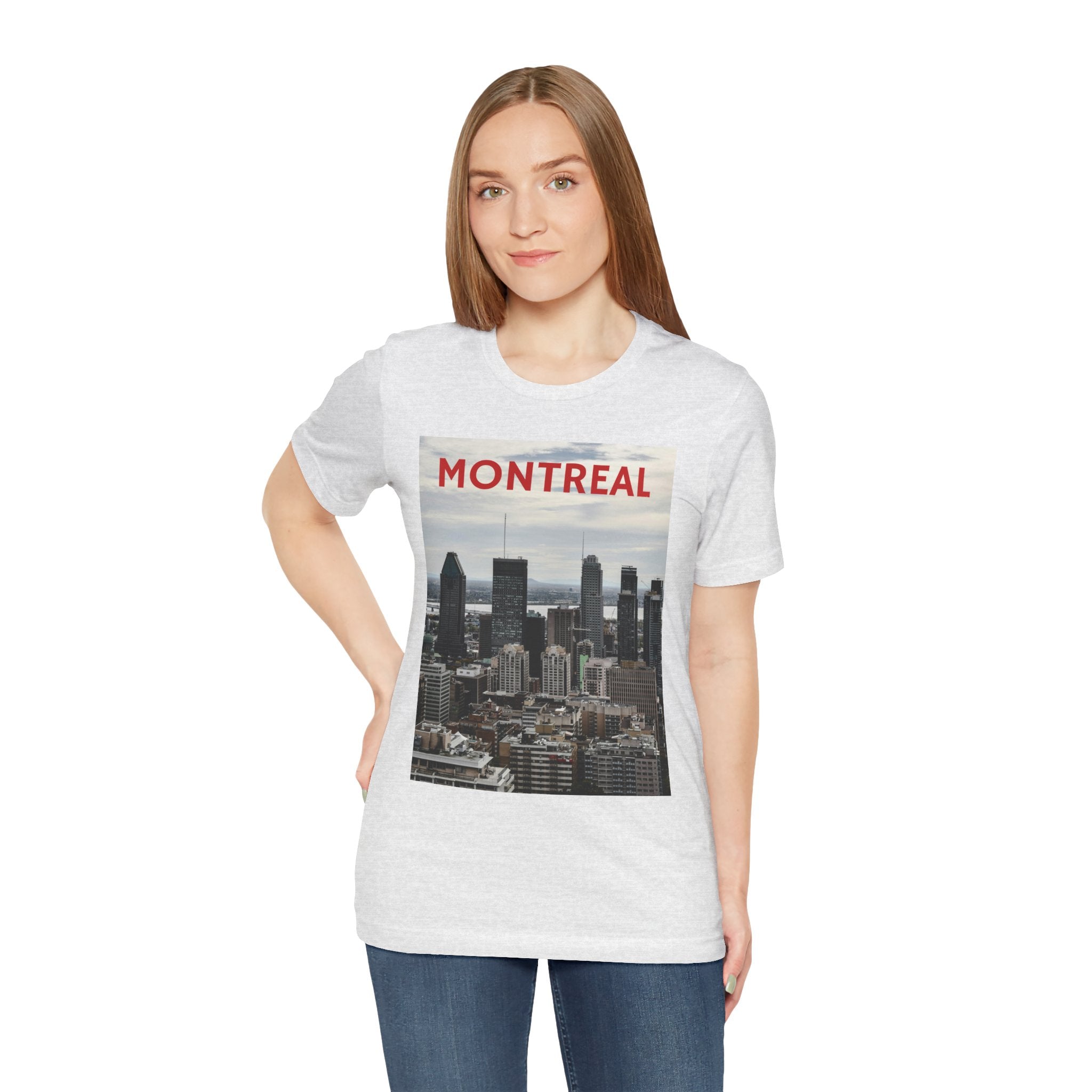 Woman wearing a white t-shirt with Montreal skyline graphic and text