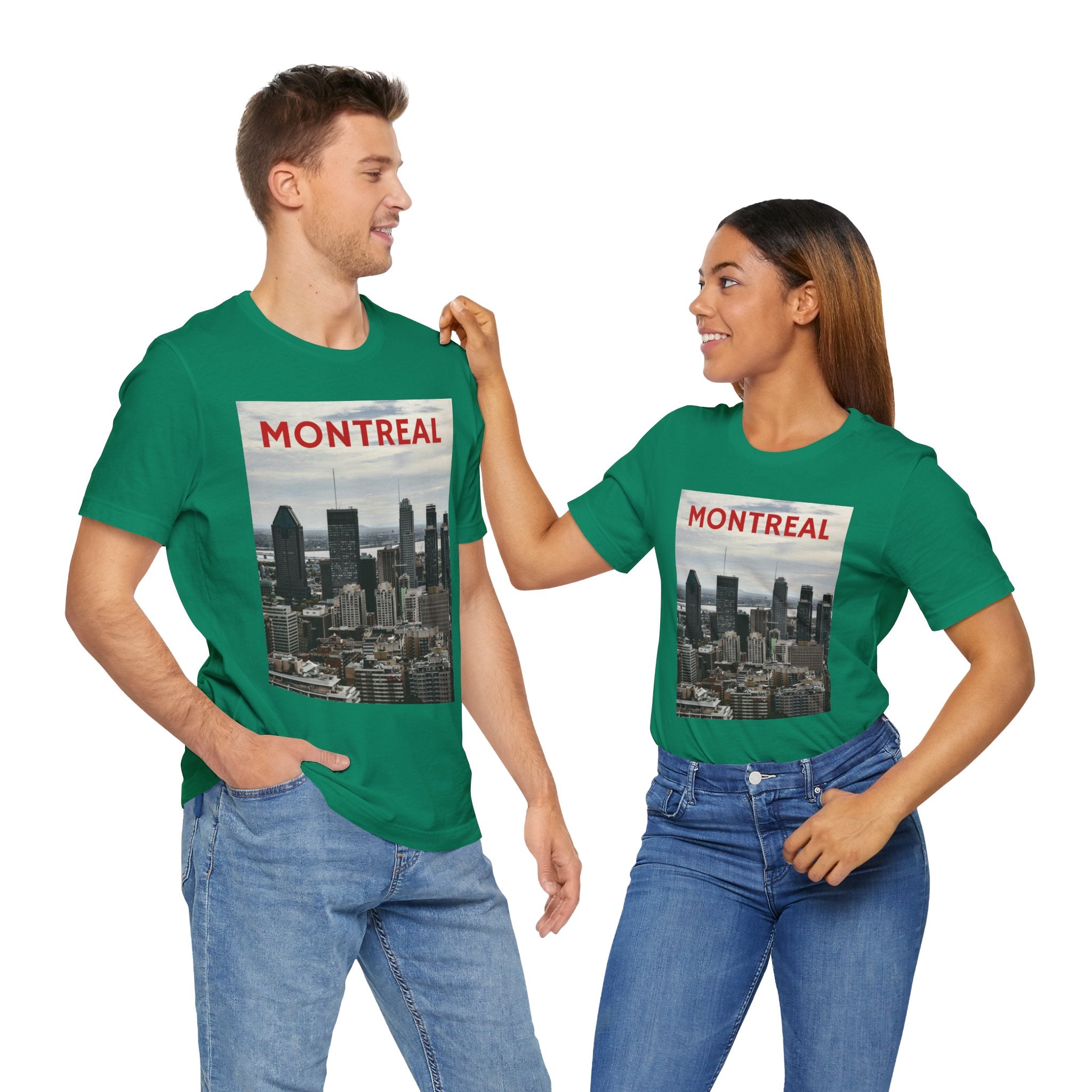 Two people wearing green t-shirts with Montreal skyline design on a white background
