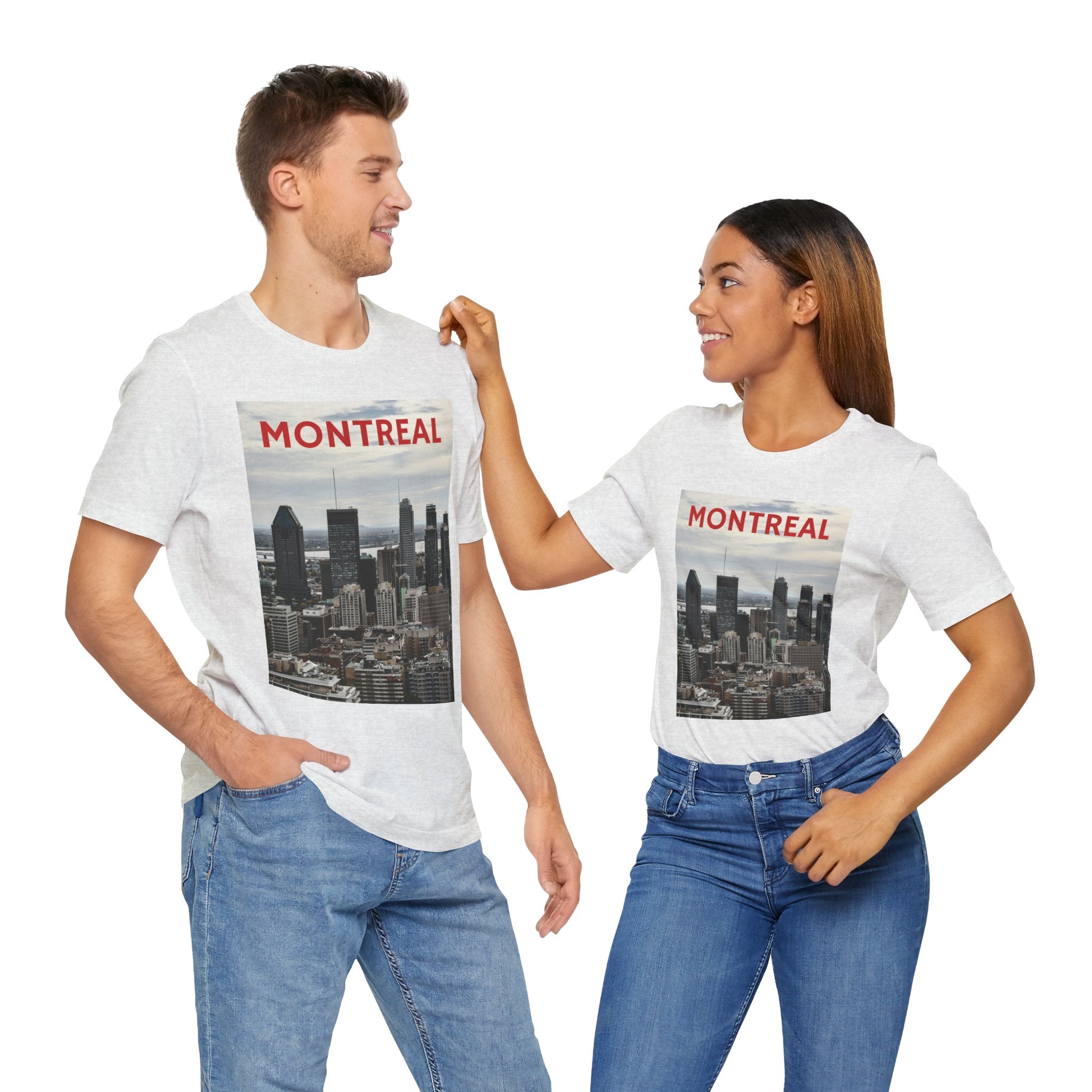 Two people wearing white t-shirts with Montreal skyline design on a white background