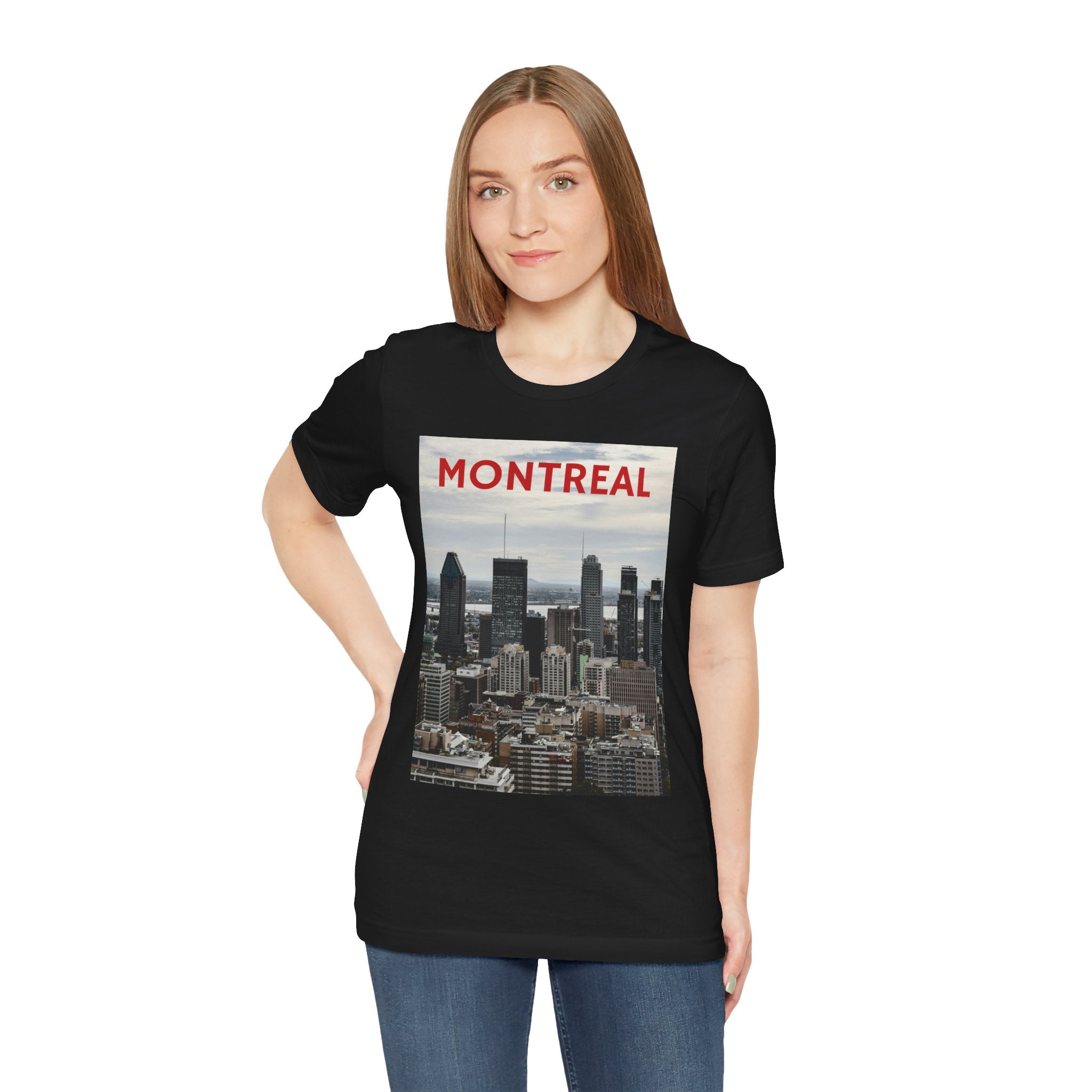 Person wearing a black t-shirt with Montreal skyline design