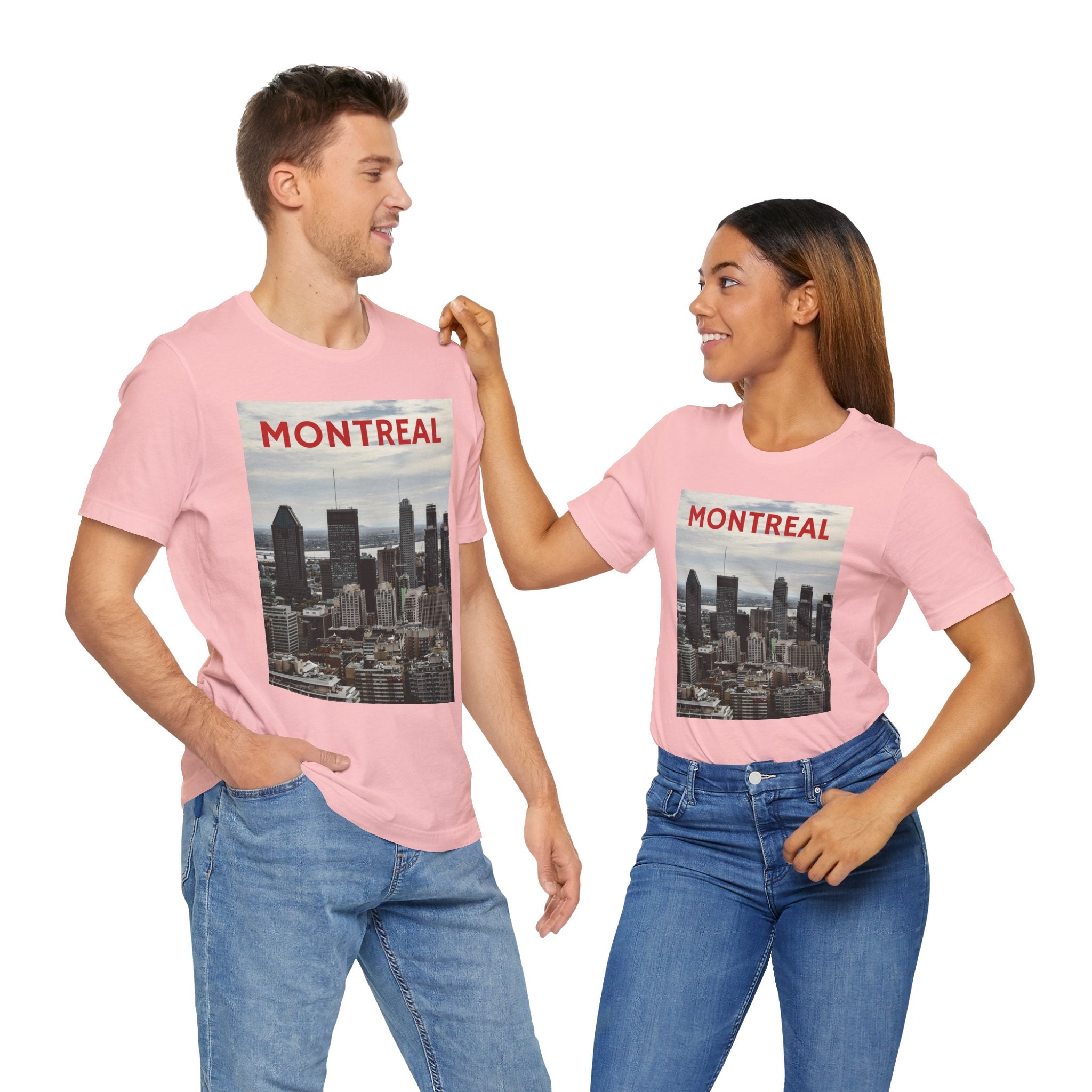 Two people wearing pink t-shirts with Montreal skyline design on a white background