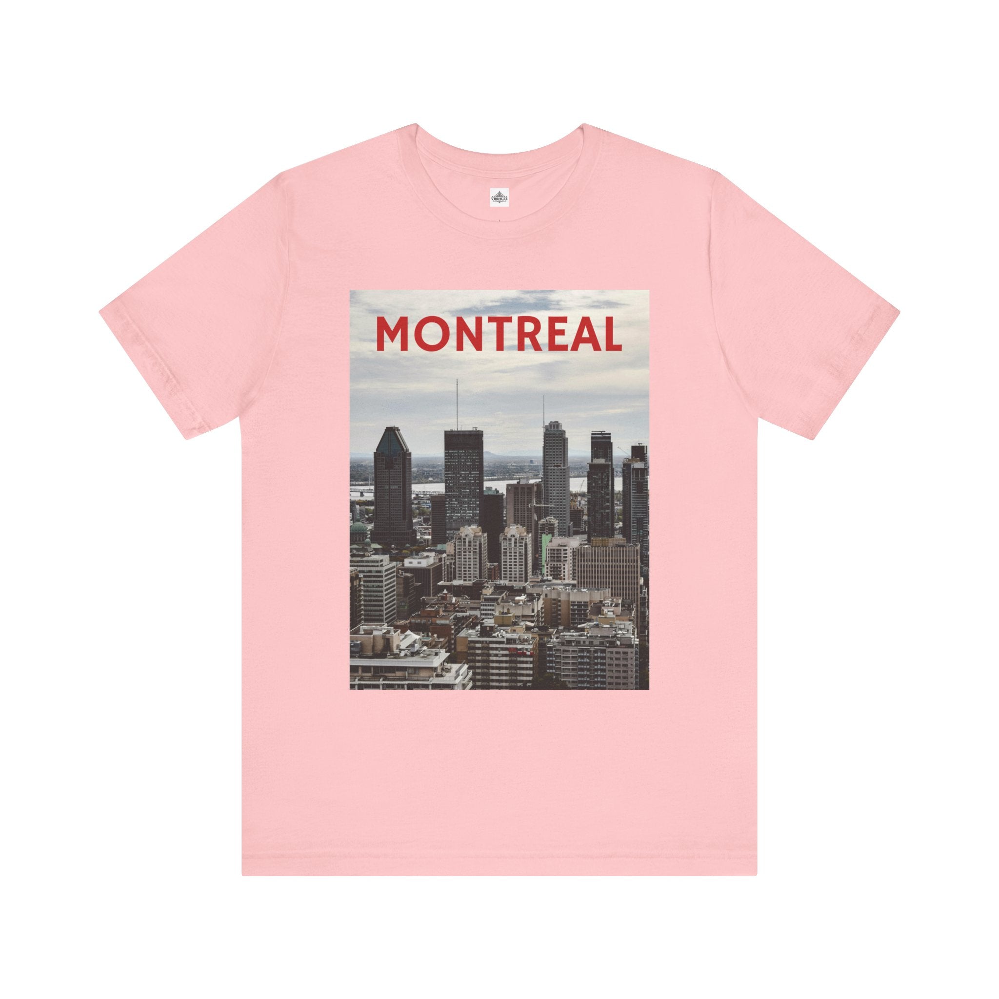 Pink t-shirt with Montreal skyline graphic and text on a white background