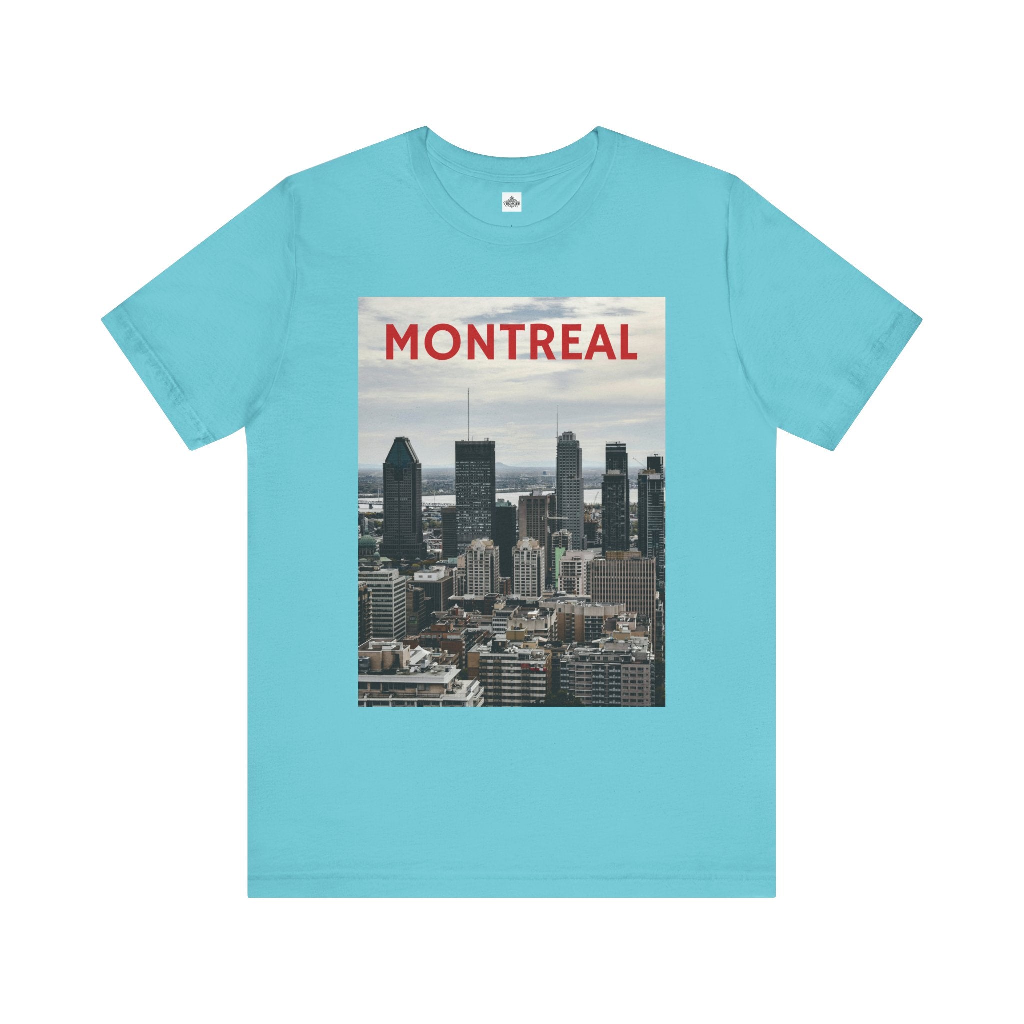Light blue t-shirt with Montreal skyline graphic and text on a white background