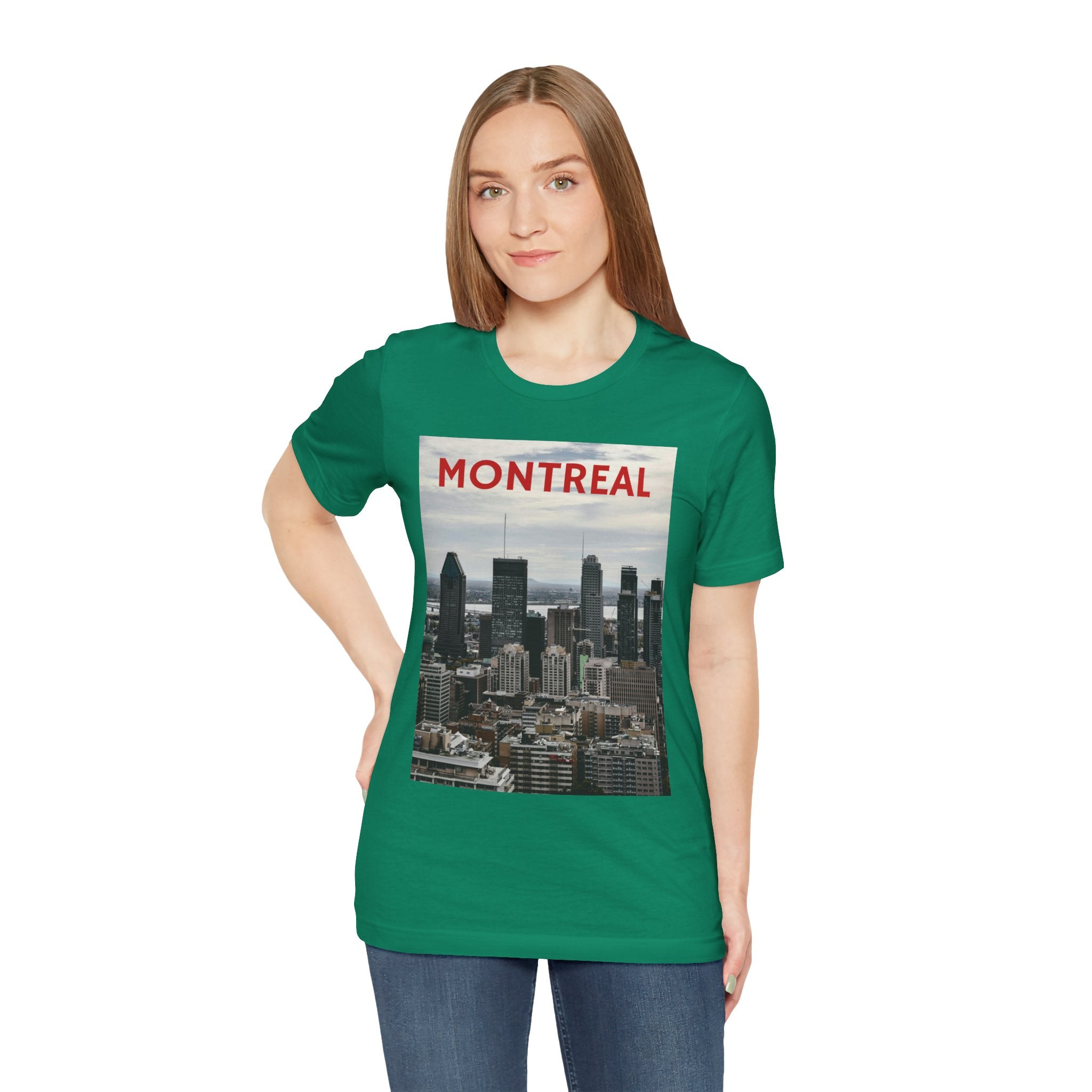 Person wearing a green t-shirt with a Montreal skyline graphic and text.